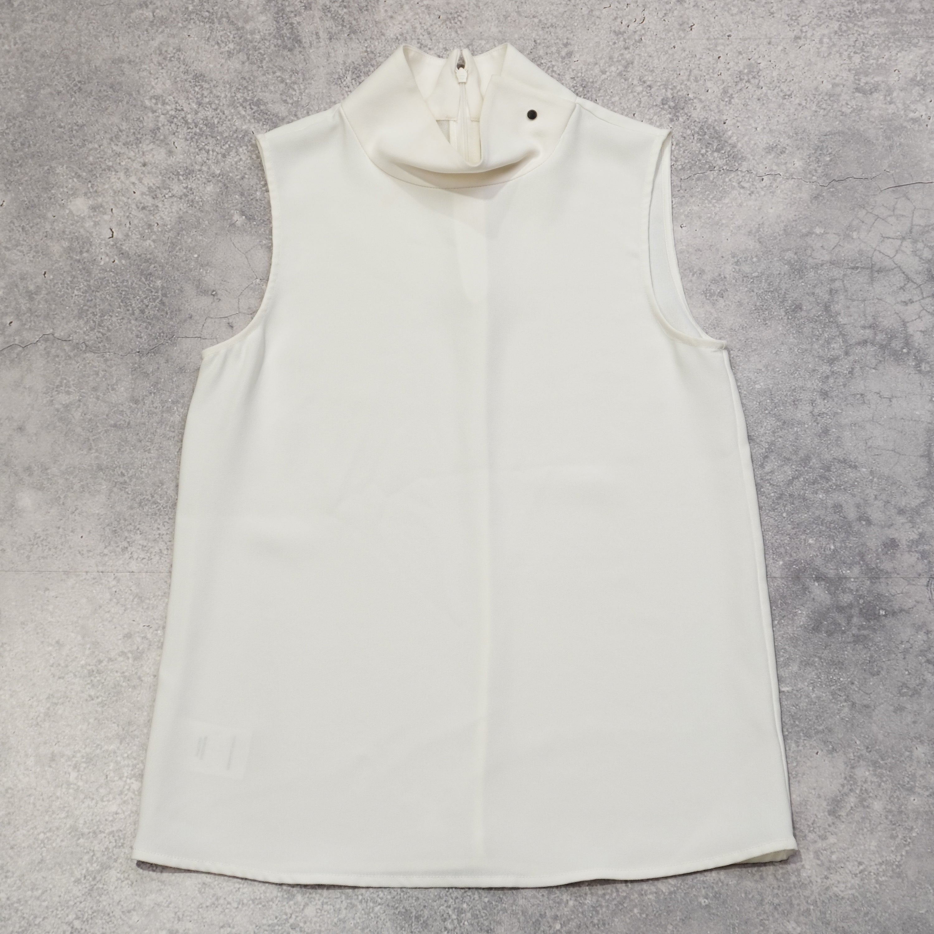 Country Road Sleeveless Mock Neck Top
