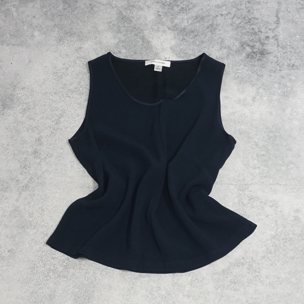 Perri Cutten Sleeveless Peplum Top