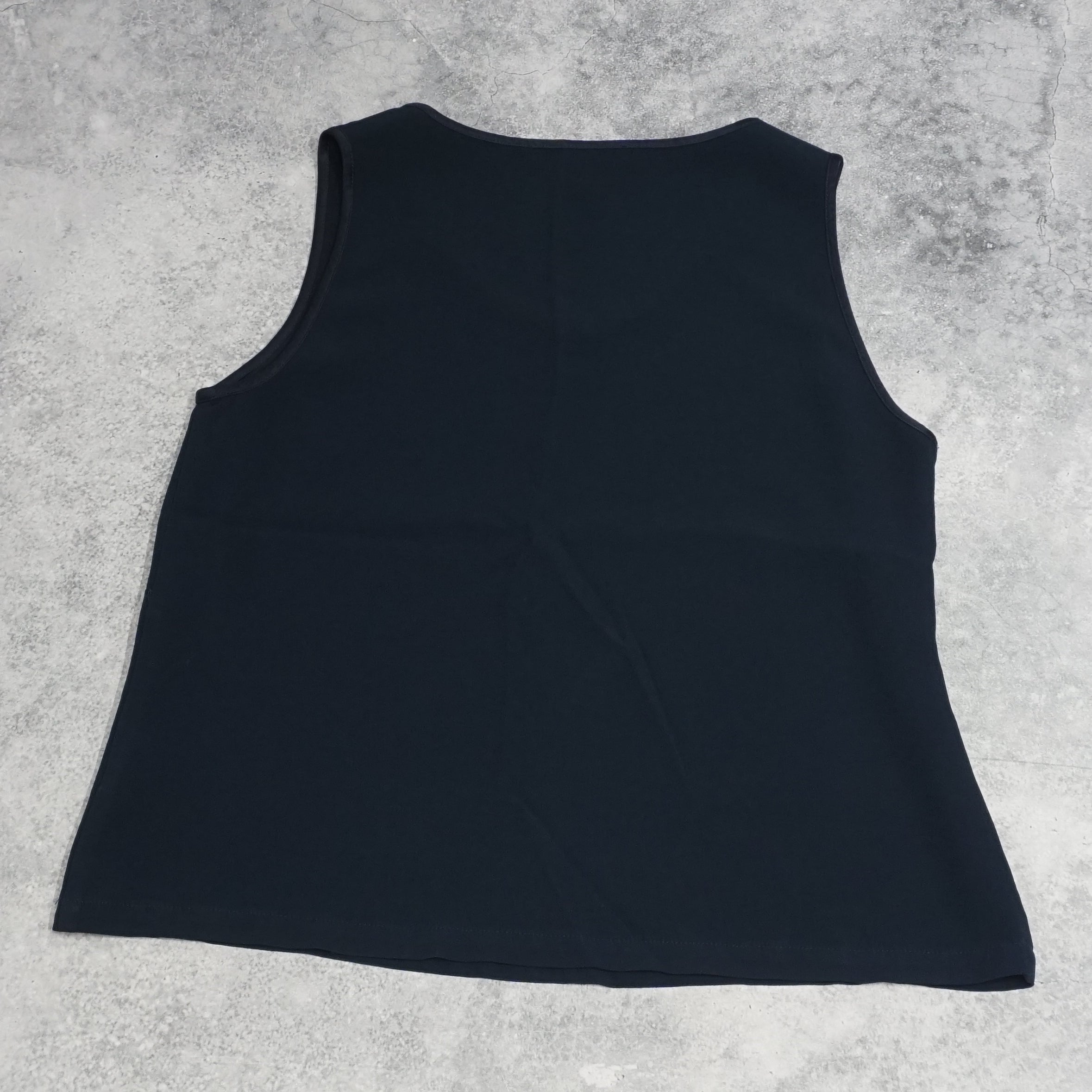 Perri Cutten Sleeveless Peplum Top
