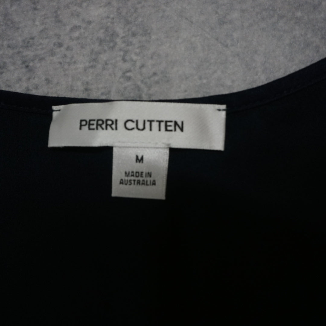 Perri Cutten Sleeveless Peplum Top