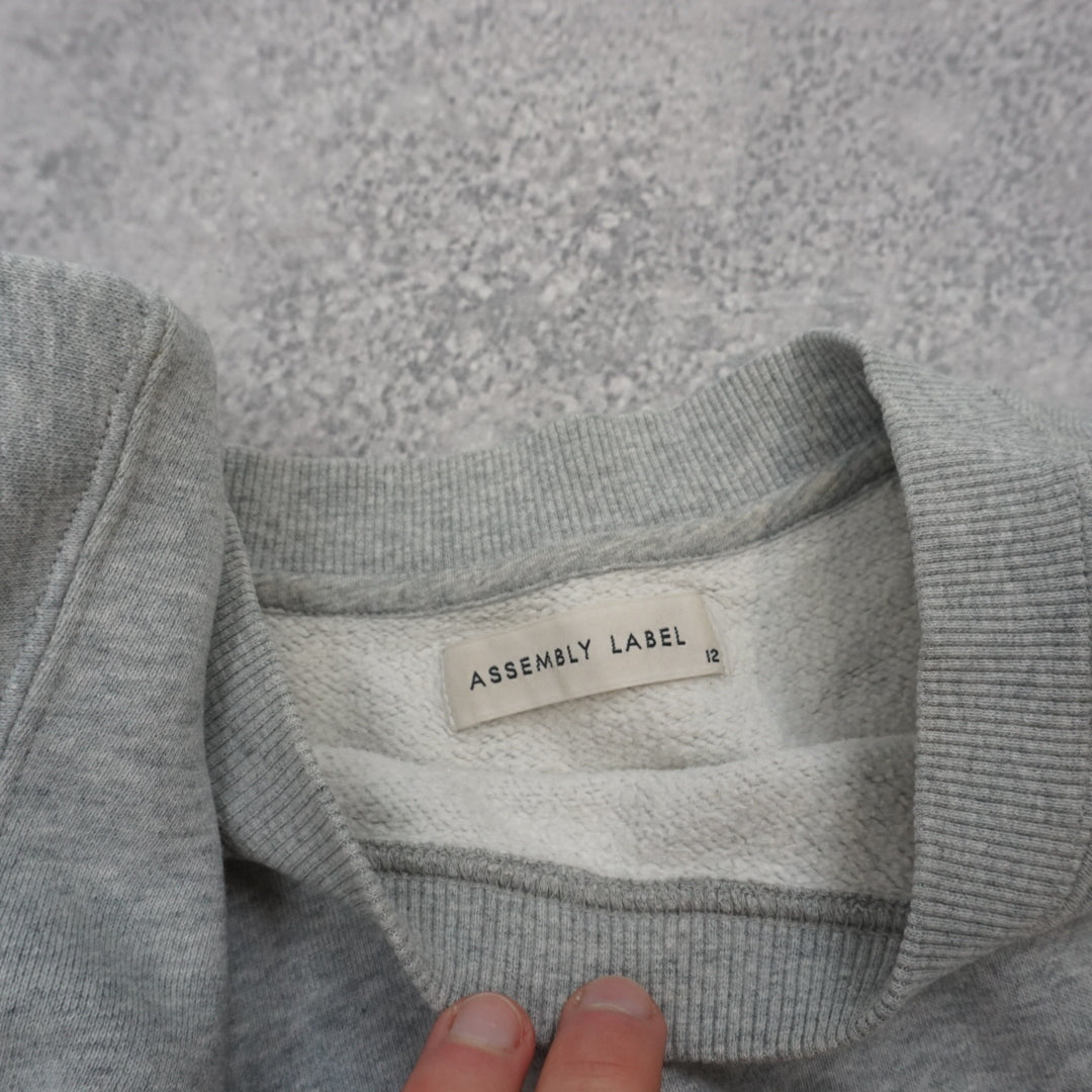 Assembly Label Sweater