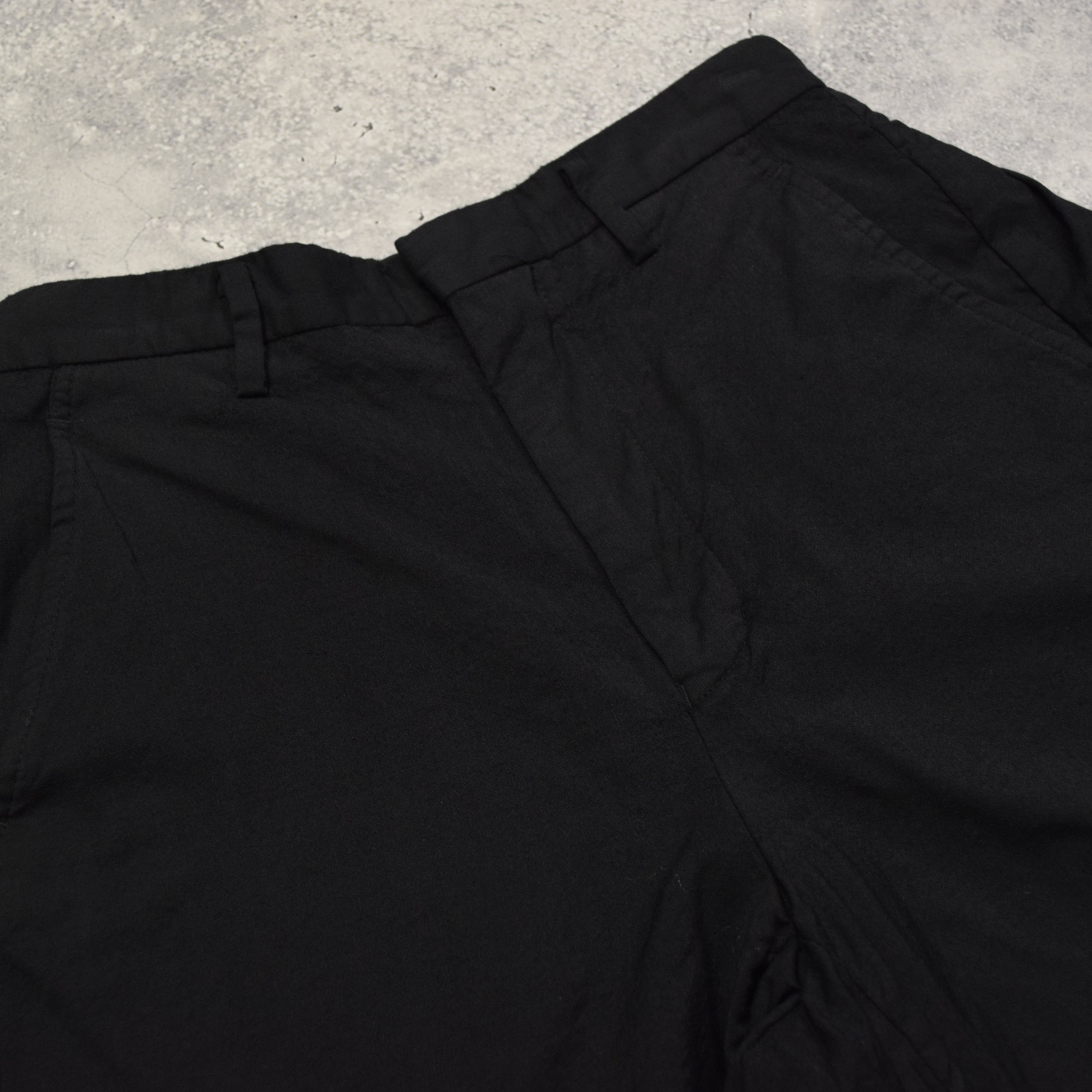 Noir Kei Ninomiya Back Pleat Shorts