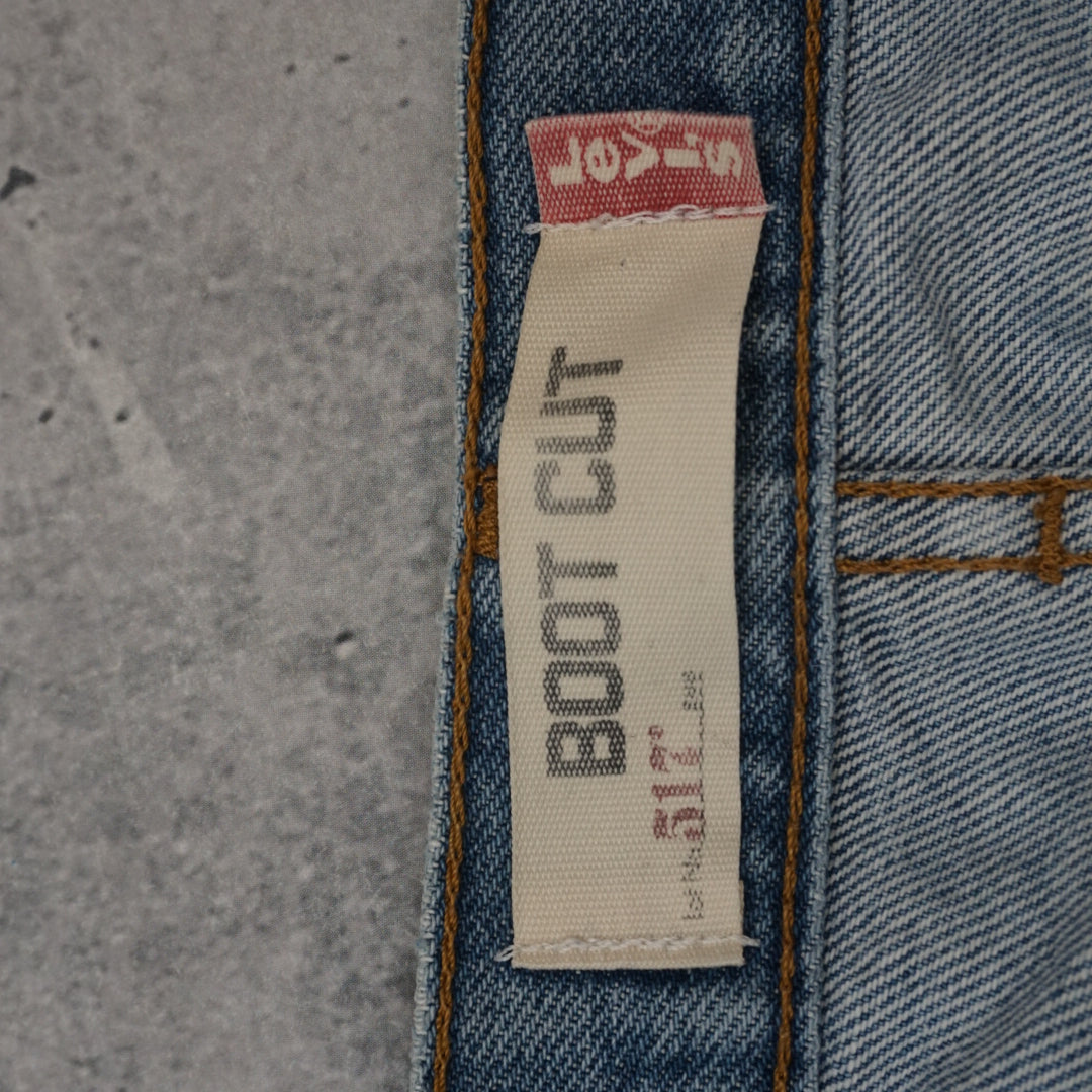 2000s Levi's 517 Boot Cut Distressed Jeans
