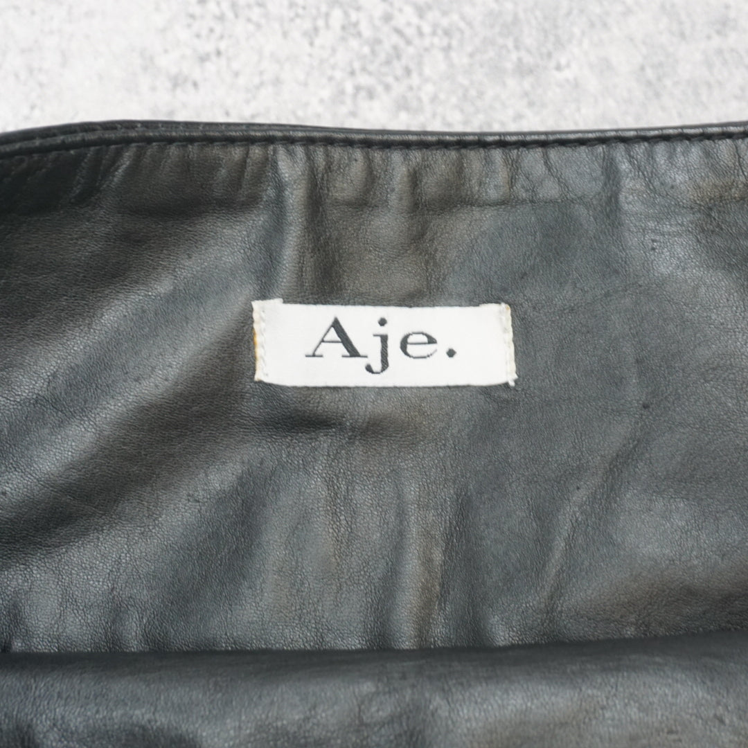 Aje. Leather Pleated Skirt