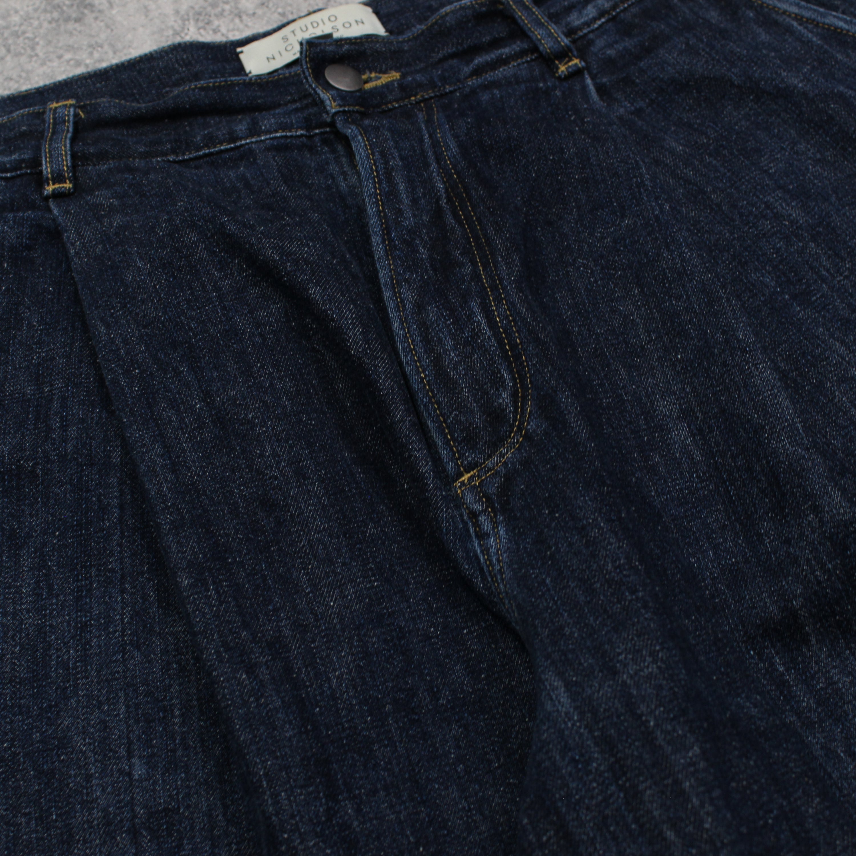 Studio Nicholson Wide Leg Pleated Jeans
