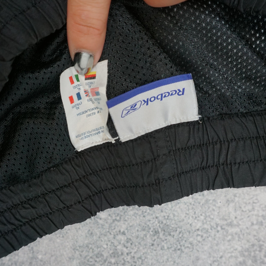2000s Reebok Piped Zip Hem Track Pants