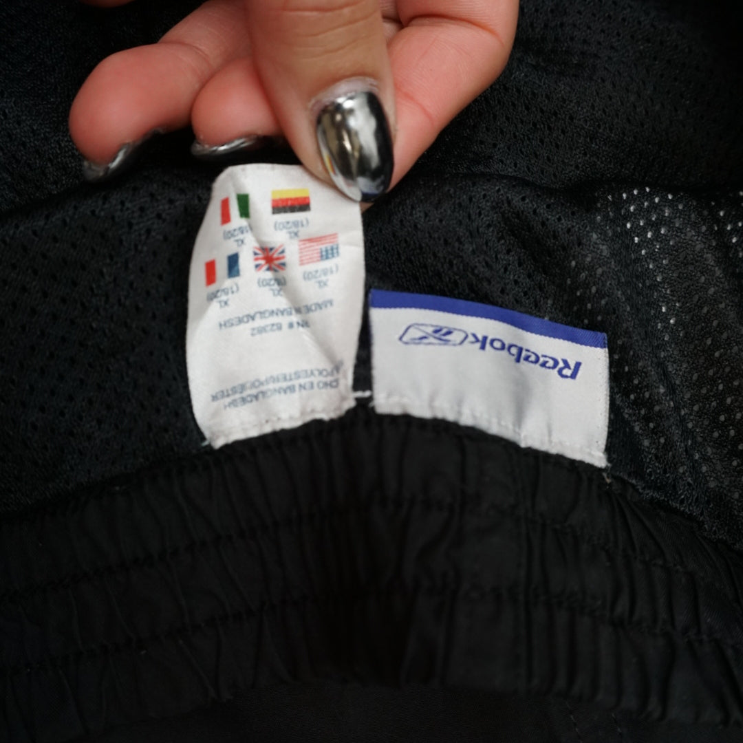 2000s Reebok Piped Zip Hem Track Pants
