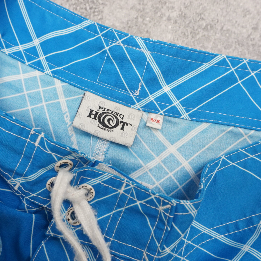 Piping Hot Plaid Board Shorts