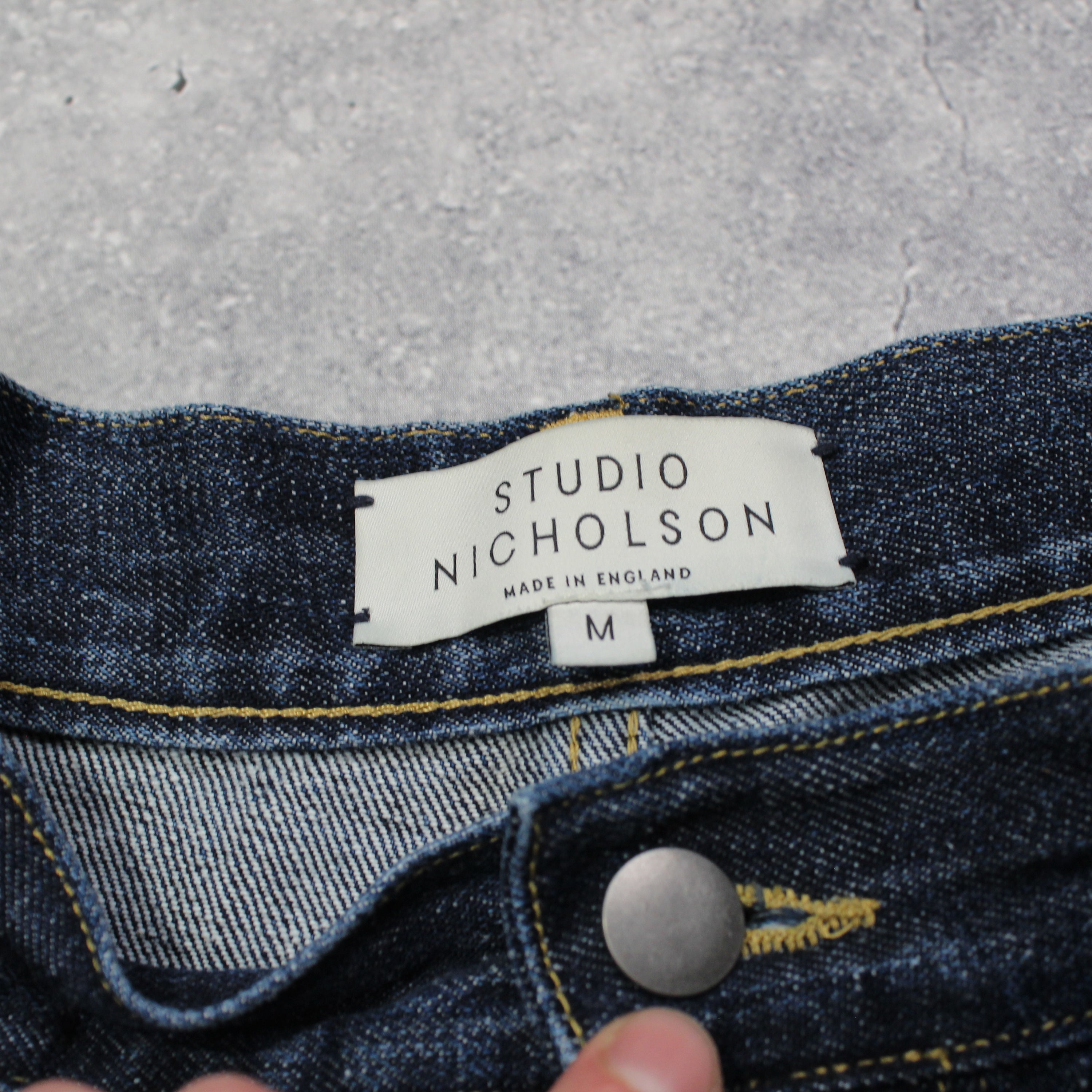 Studio Nicholson Wide Leg Pleated Jeans