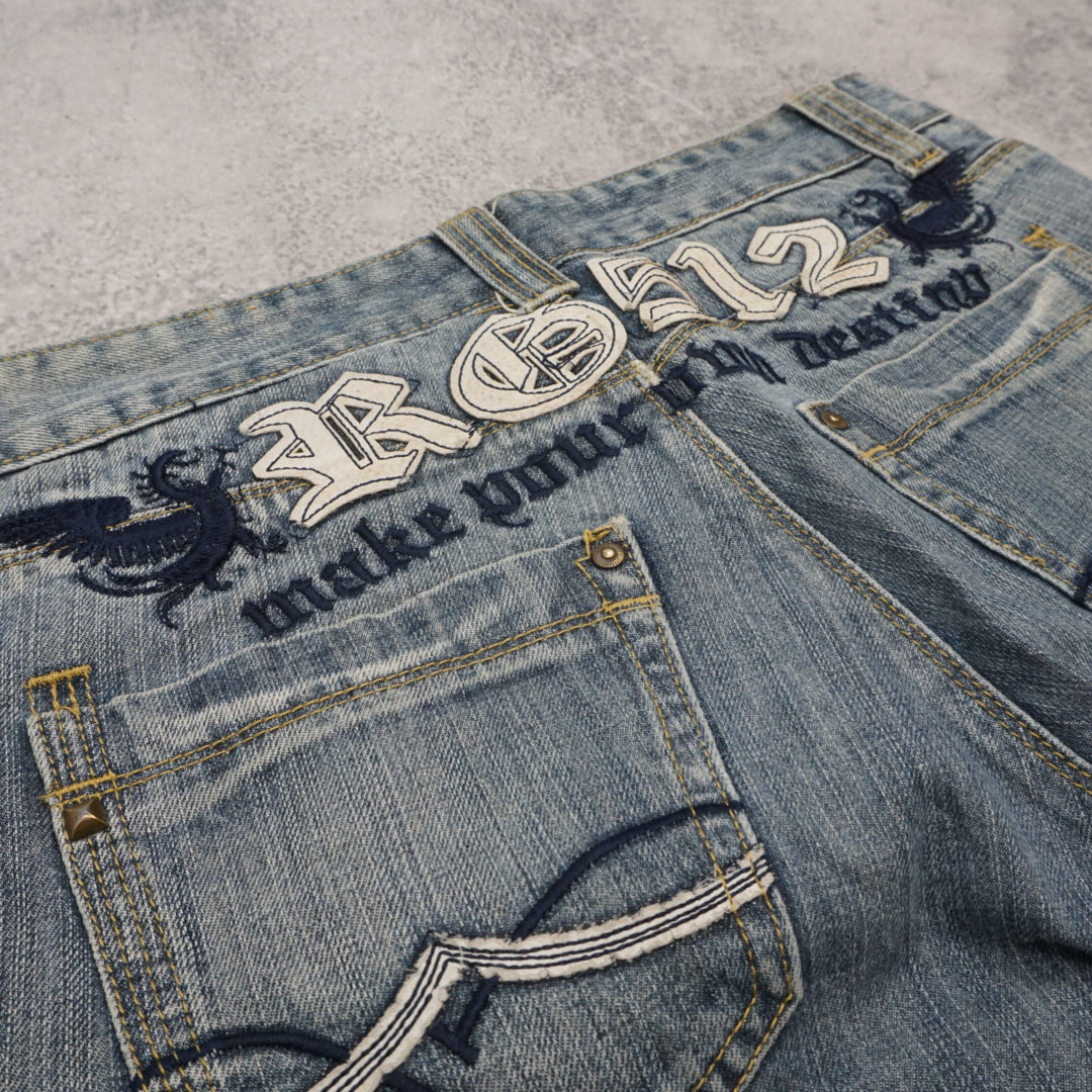2000s Rg512 Embroidered Graphic Jeans